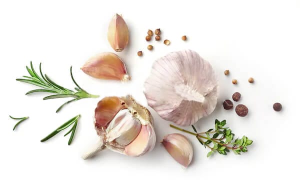 Garlic Herbs Isolated On White 600w 587395172 1